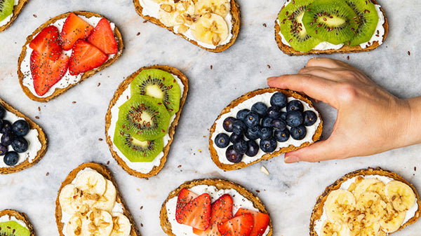  A selection of healthy pregnancy foods on a light background