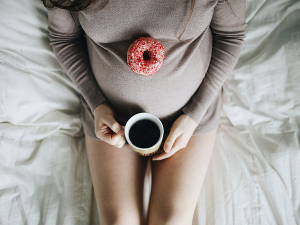 Donut on pregnant lady's bump