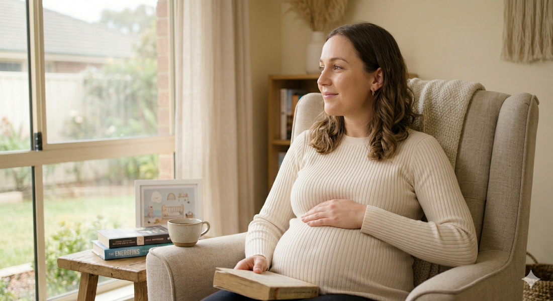 Pregnant woman in her second trimester at home in soft natural light with a visible baby bump