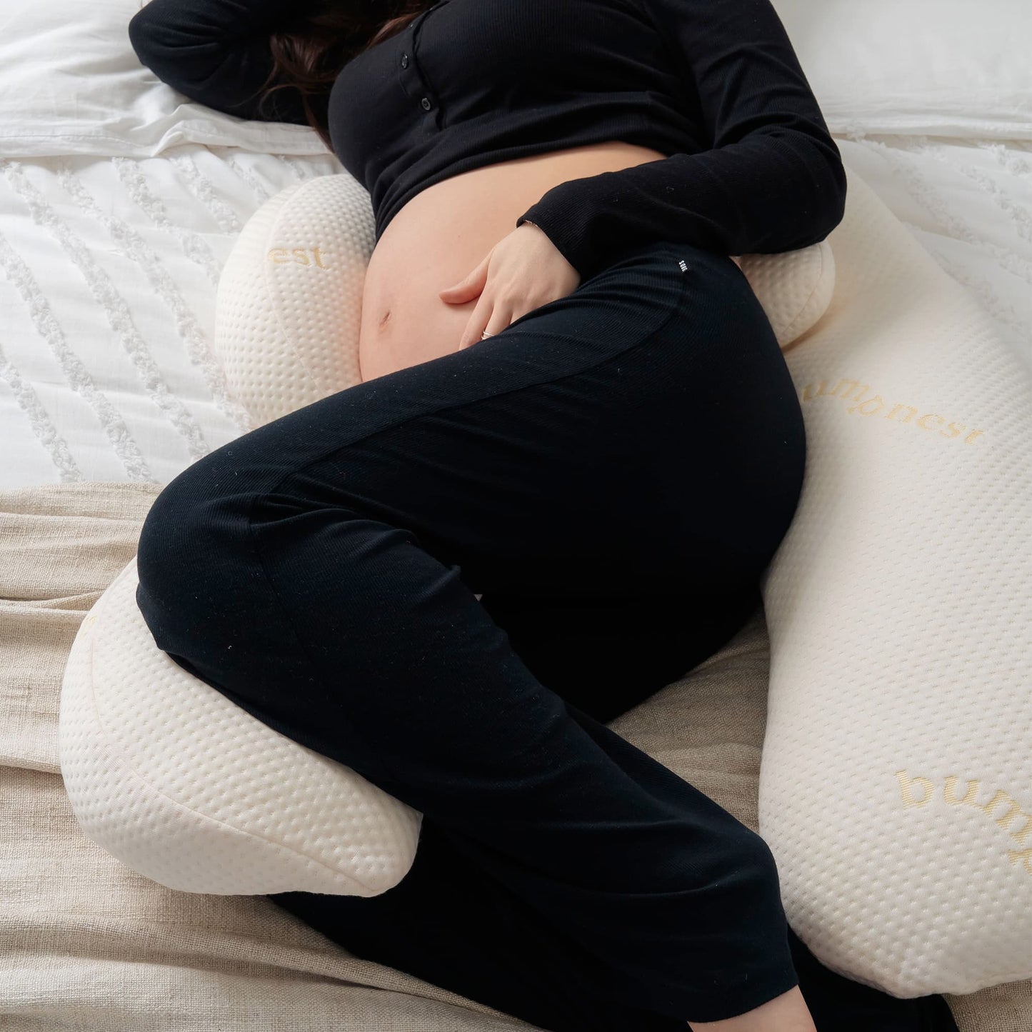 Bumpnest maternity pillow providing hip and lower back support during pregnancy